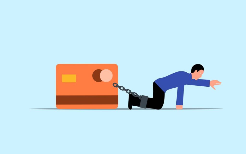 Illustration of a person chained to a credit card, symbolizing the potential debt burden of credit card misuse.